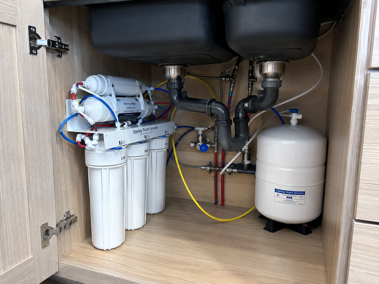 Under-sink reverse osmosis water filtration system installed in a Treasure Coast home